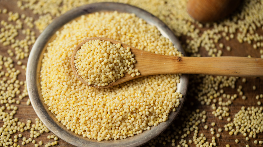 Bowl of millet with spoon