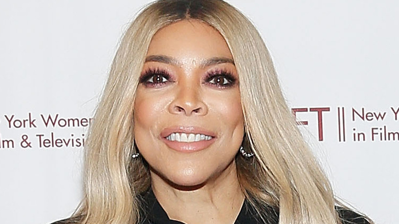 Wendy Williams smiles with hair down