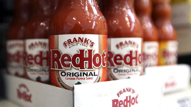 A box of Frank's Red Hot sauce