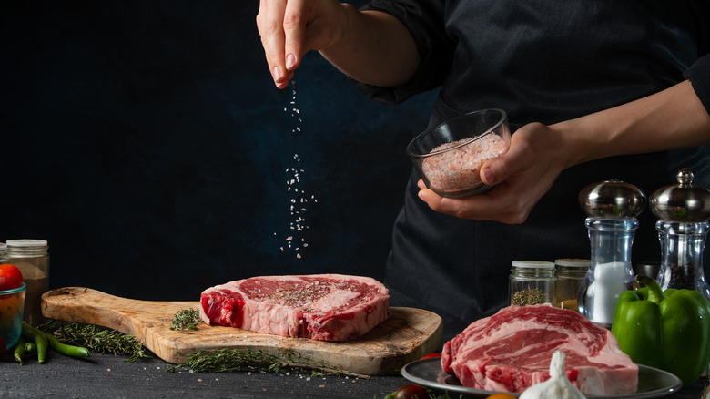 Chef preparing steak