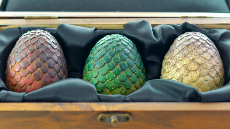 Brightly colored dragon eggs in a box