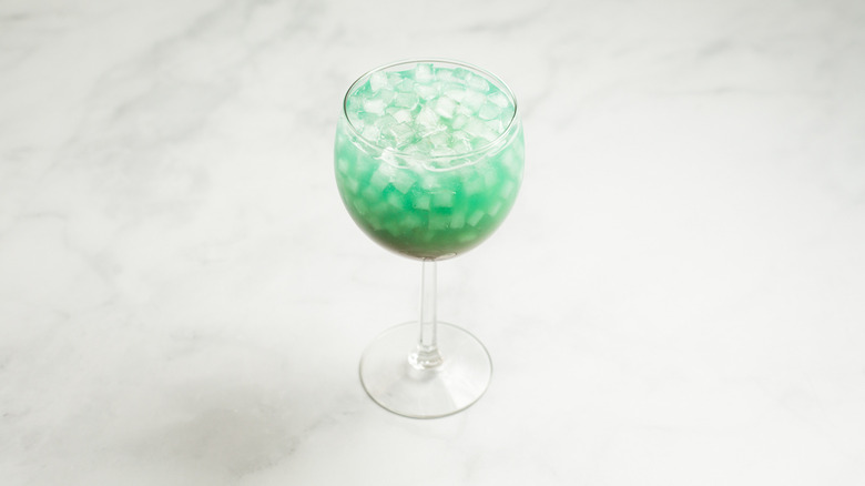 turquoise cocktail on marble table
