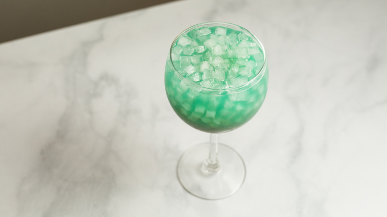 turquoise cocktail on marble table