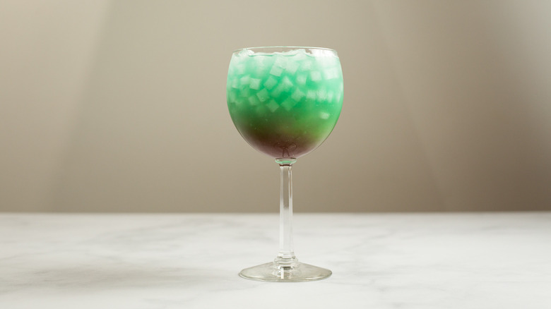 turquoise cocktail on marble table