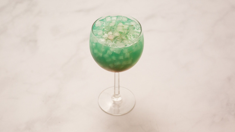 multicolored cocktail on marble table