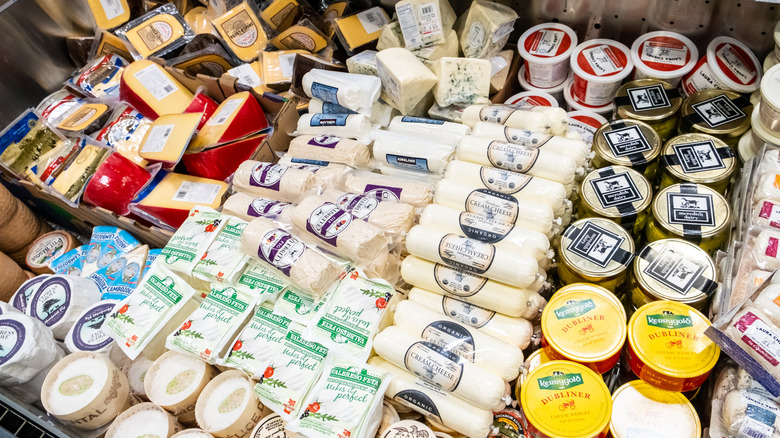 selection of cheeses at a store