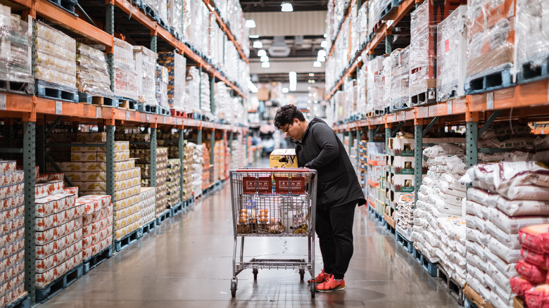 Shopper in Costco aisle