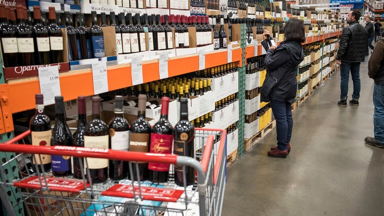 shopping cart with wine bottles