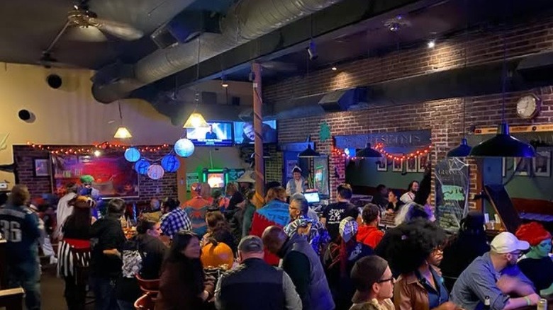Interior and crowd at Dead Presidents Pub