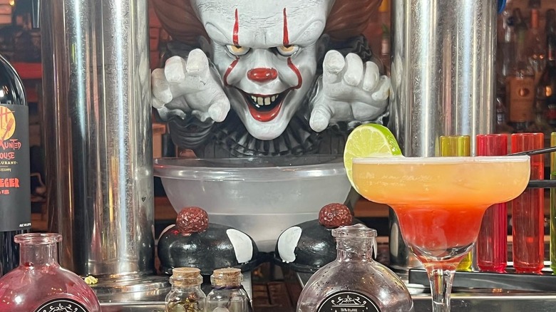 A cocktail and the decor at The Haunted House Restaurant