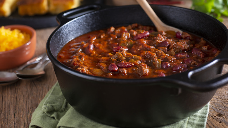Meat chili in a cast iron pot
