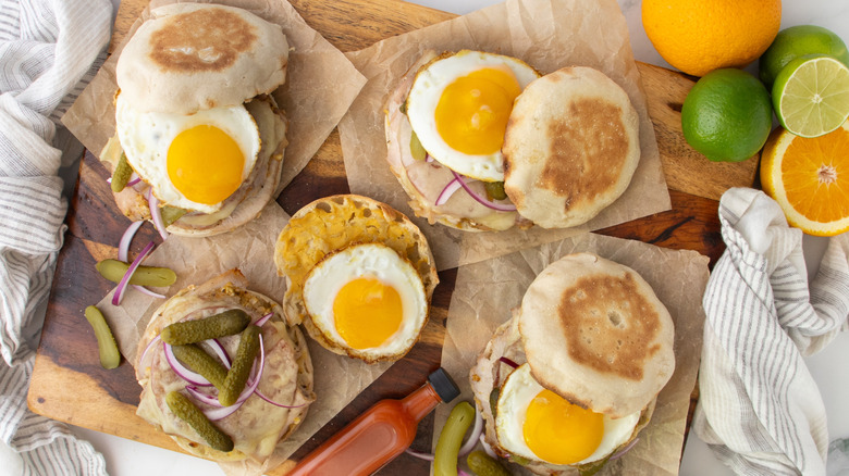 cuban-style breakfast sandwiches on wooden board