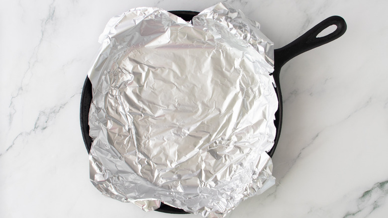 skillet lined with tin foil