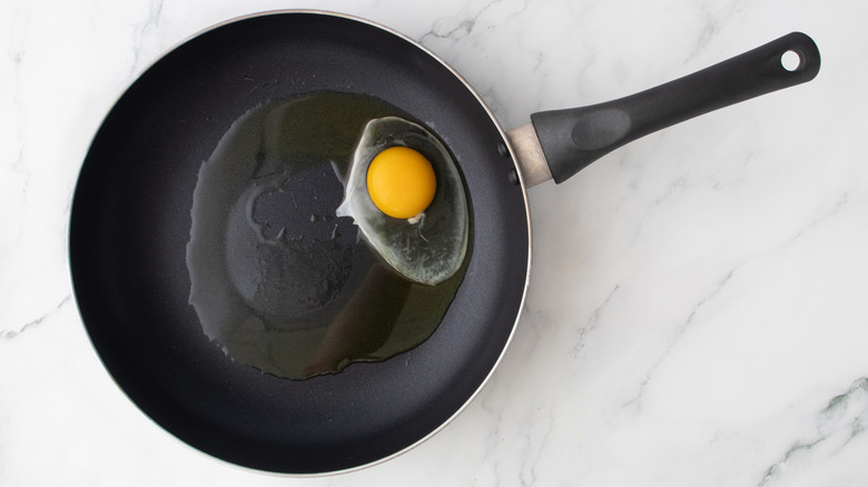 egg cooking in skillet