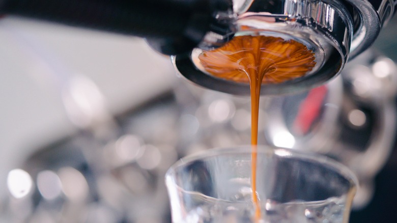espresso shot pouring into glass