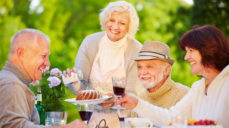 elderly people celebrating a birthday