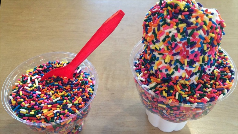 cup of ice cream and rainbow sprinkles