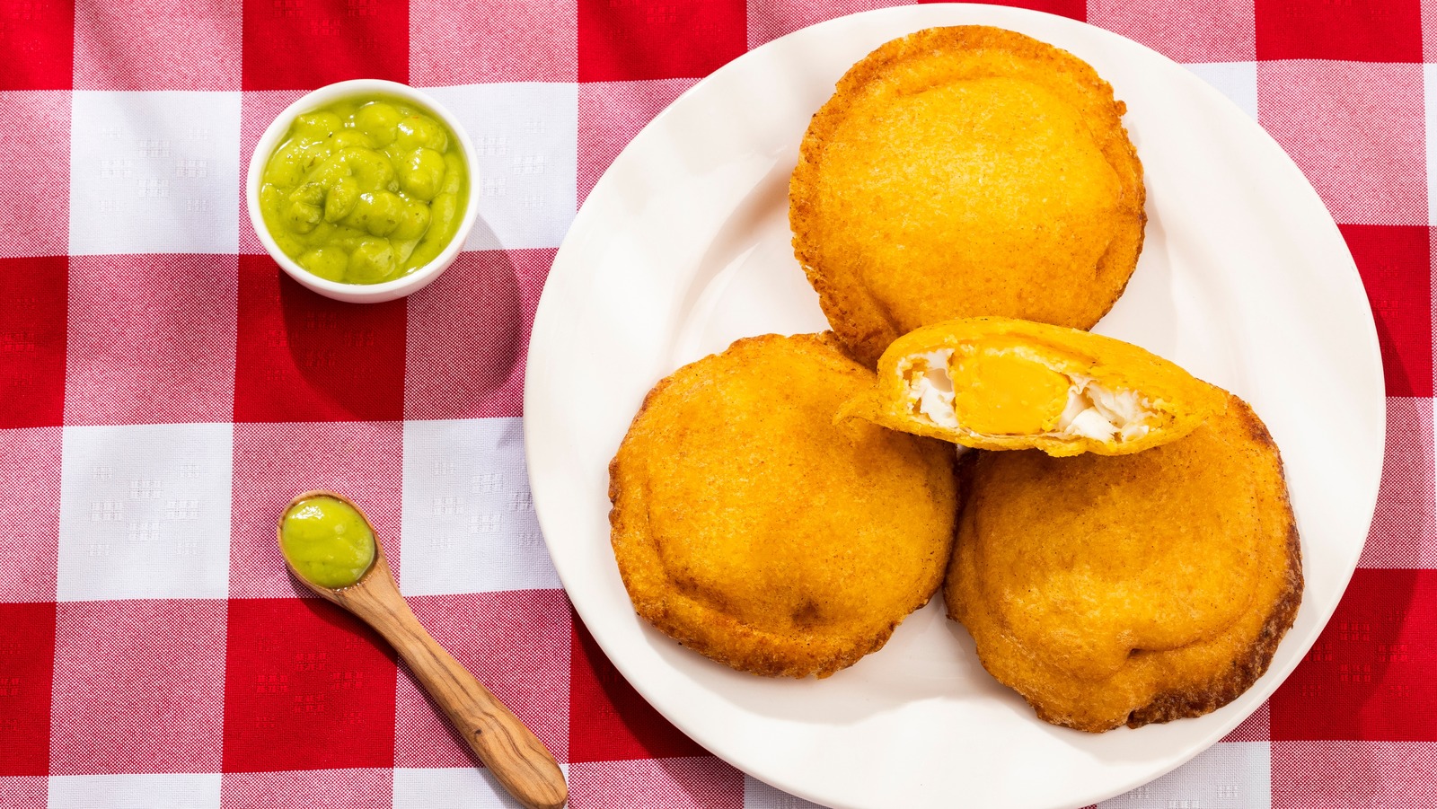 The Debated Origins Of Arepa De Huevo, A Cornmeal Breakfast Sandwich