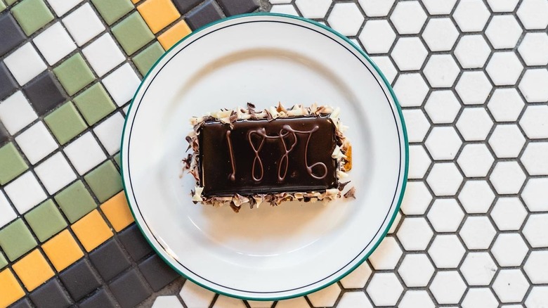The Driskill Hotel's 1886 chocolate cake on white plate