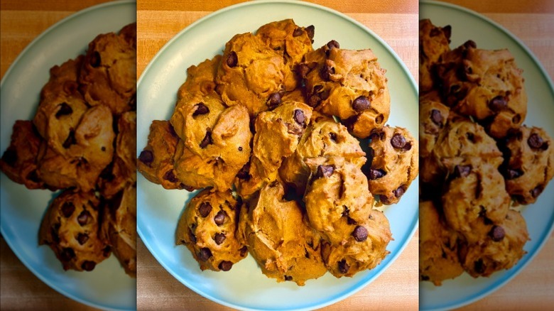 Pumpkin chocolate chip cookies on plate.