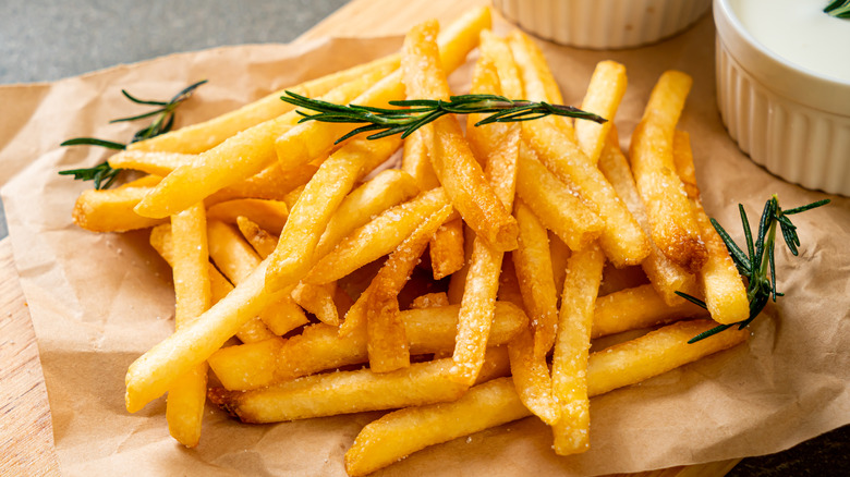 French fries on a cutting board