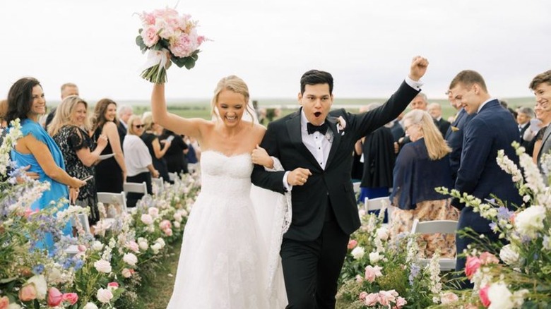 Alex Drummond and husband Mauricio celebrating