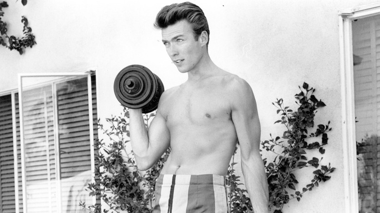 Clint Eastwood lifting weights