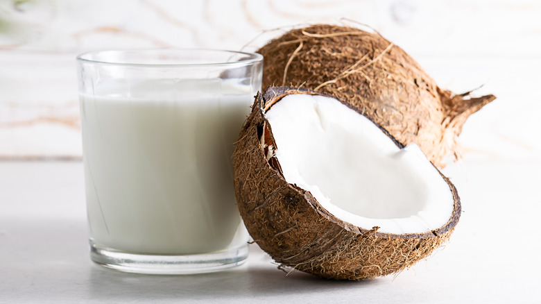 coconut shell next to glass