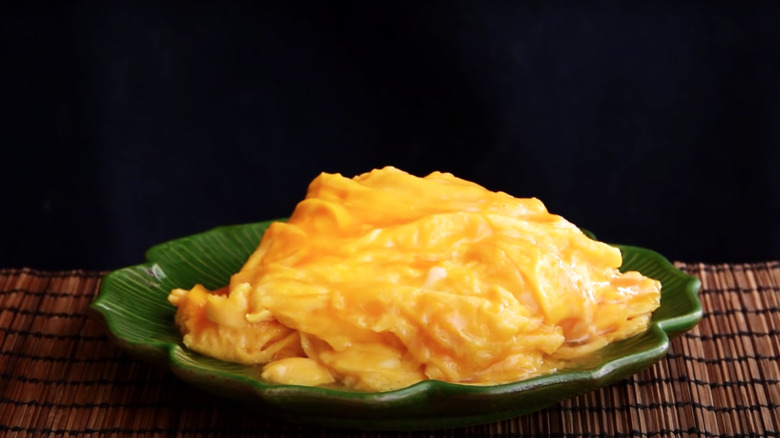 Cantonese style eggs on green plate