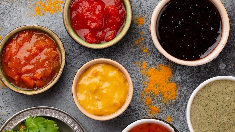 bowls of chutney and sauces
