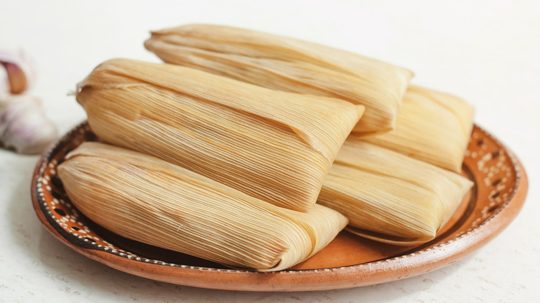 mexican tamales on a plate