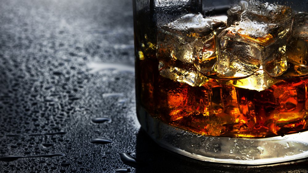 Whisky in a glass with ice cubes