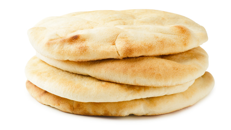 Four pita breads stacked