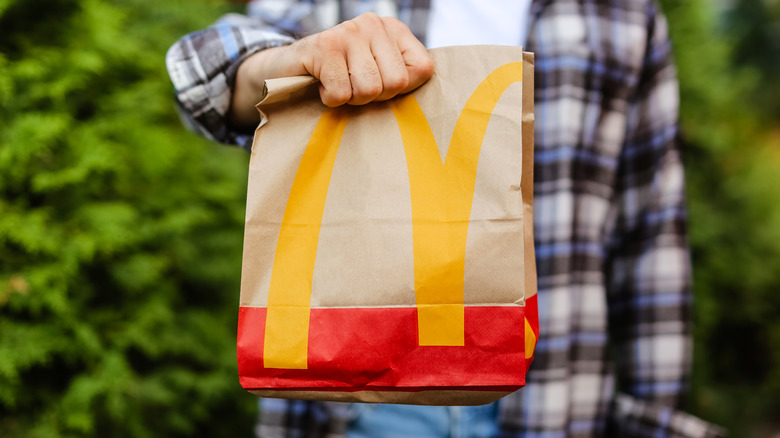 Person holding McDonald's bag