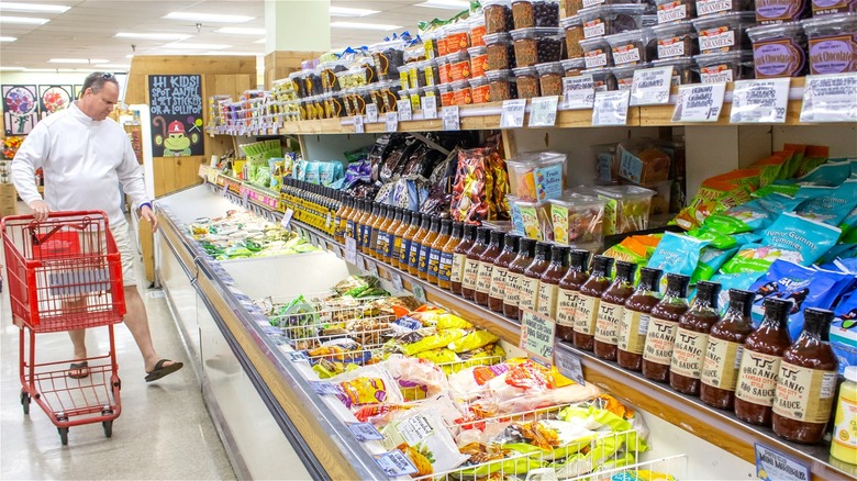 Man shopping with cart at Trader Joe's