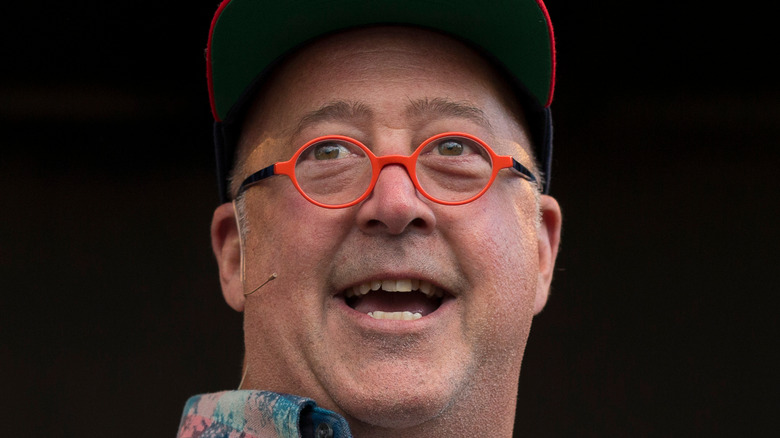 Andrew Zimmern smiling