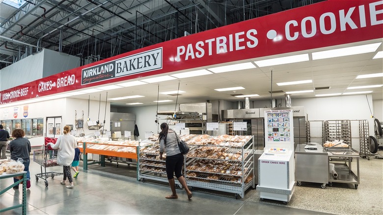 Costco shoppers browsing the bakery section.