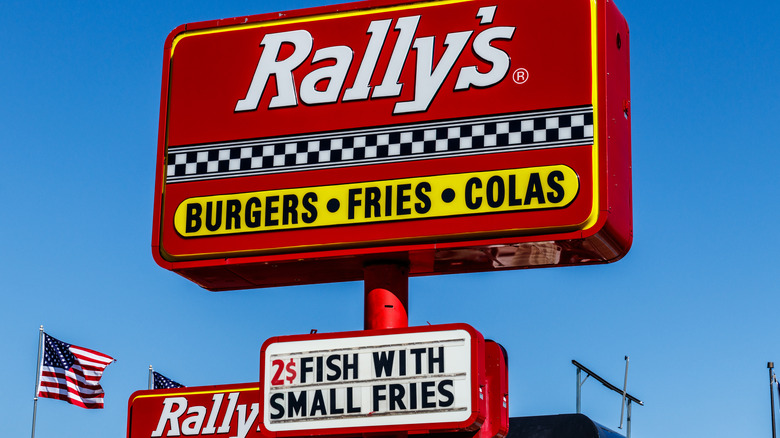 Rally's sign and U.S. flag