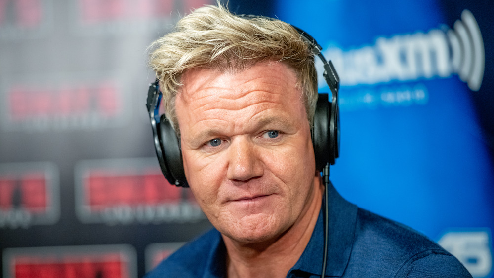 Gordon Ramsay wearing headphones