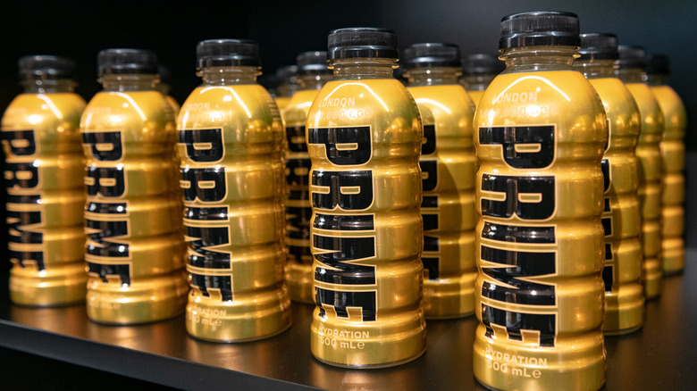 A shelf filled with limited edition PRIME Gold Bottles
