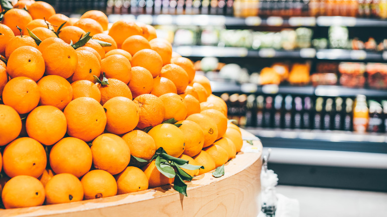 grocery store display of oranges
