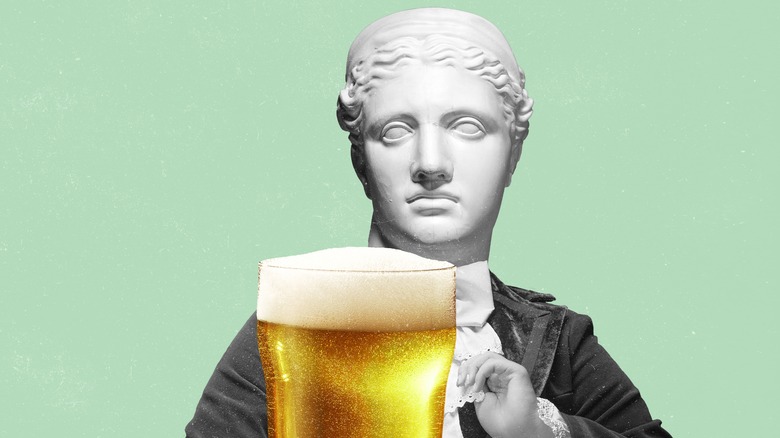 Ancient sculpture and an alcoholic beverage