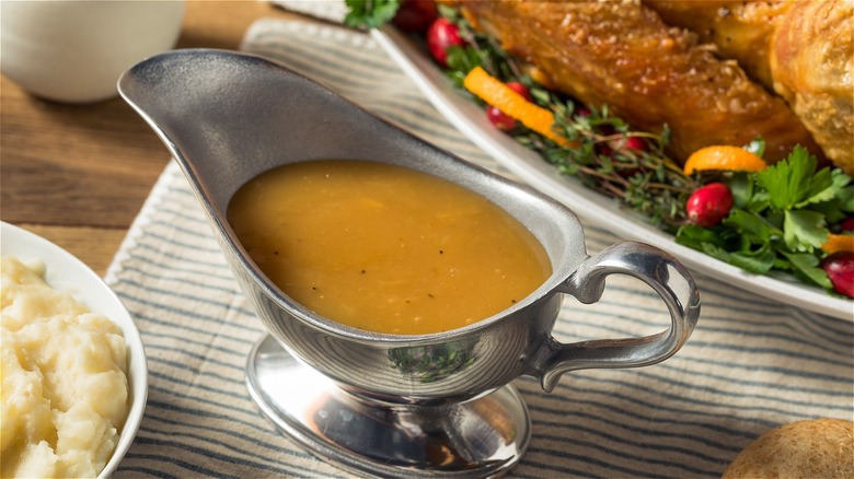 A gravy boat filled with gravy