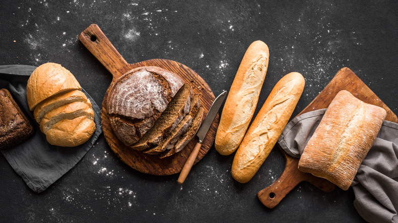 Assorted breads on cutting board