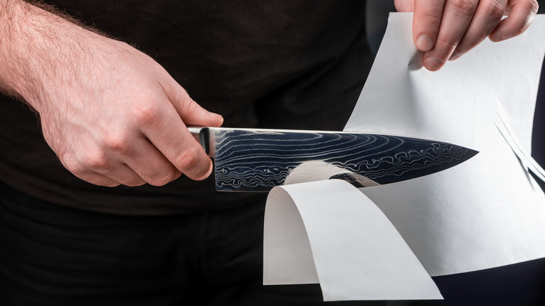 https://www.mashed.com/img/gallery/the-easiest-way-to-test-if-your-knives-are-sharp/use-the-paper-test-1667927664.jpg