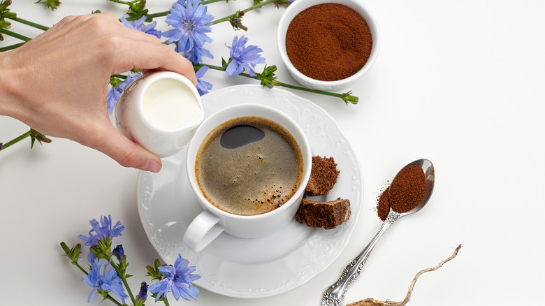cup of hot coffee with chicory and dairy creamer