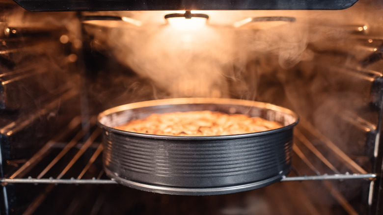 Cake baking in oven