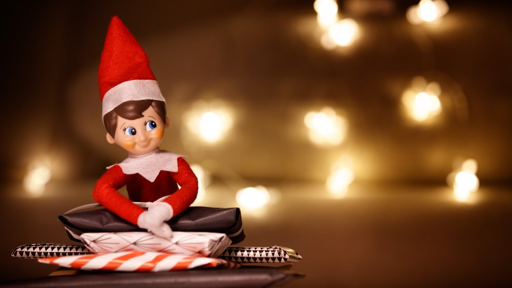 Elf on the Shelf with lights behind