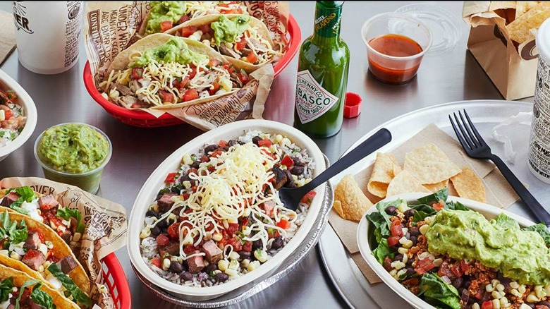 various Chipotle meals on table