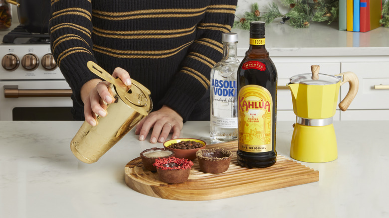cocktail shaker and strainer pouring